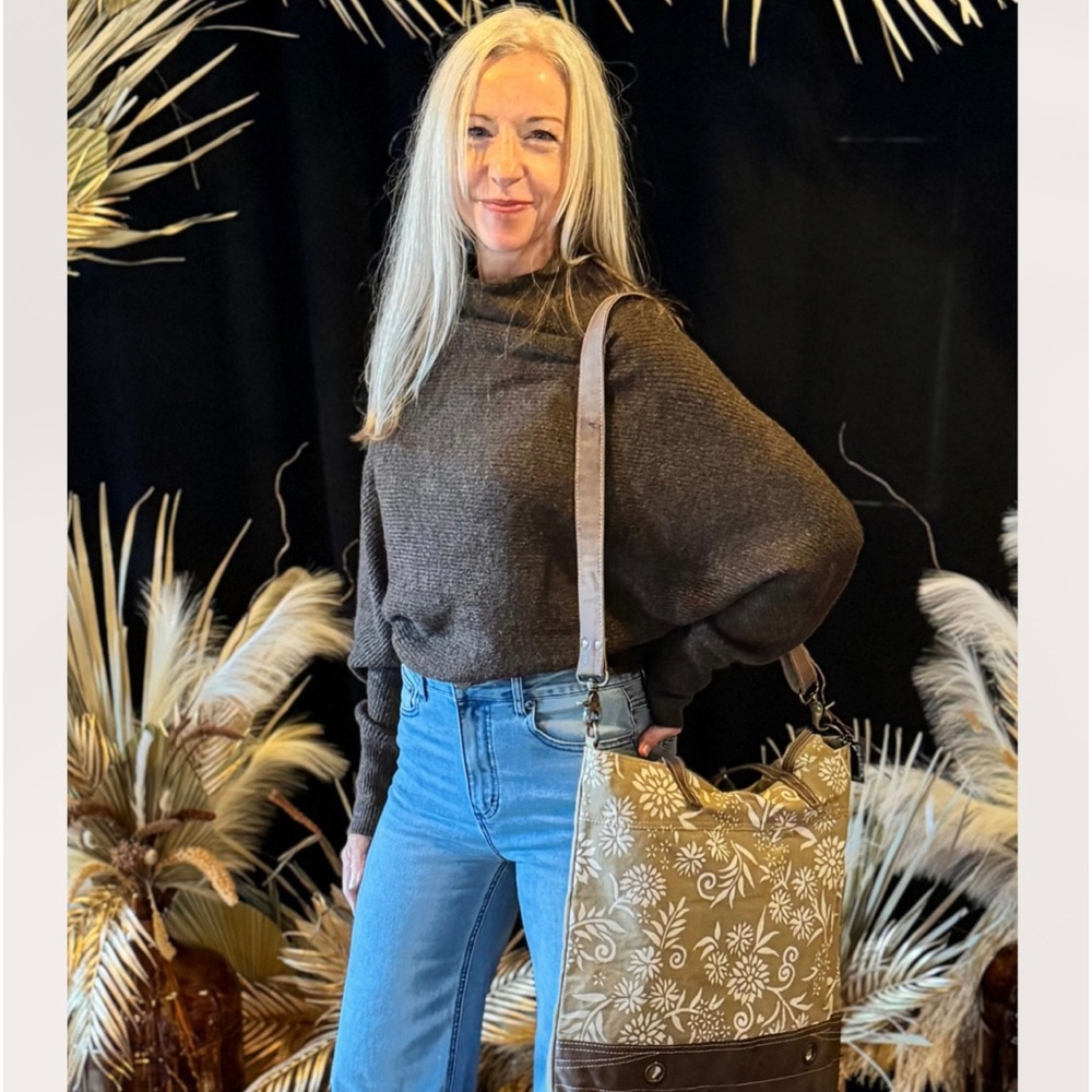 Cozy soft stylish Semi cropped length Perfect style for high waisted jeans